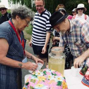 Some people trying some lemonade 