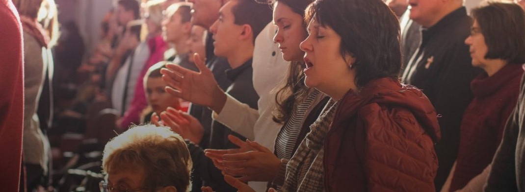 A selection of people worshiping